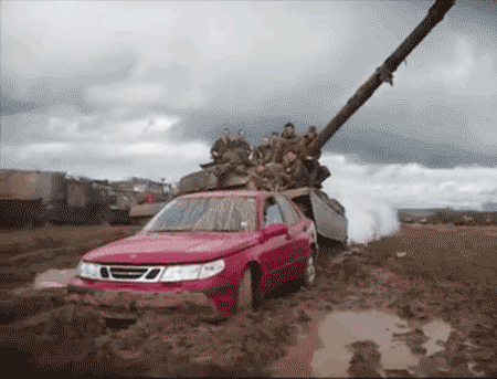 Tank with soldiers smashes Saab in muddy field - CrazyGif.com