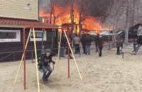 child swinging when the house burns