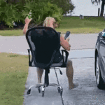 woman with office chair on slope